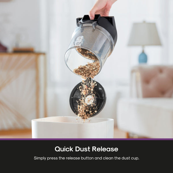 Dust collection system with a hand holding it over a bin, with text 'Quick Dust Release' at the bottom.