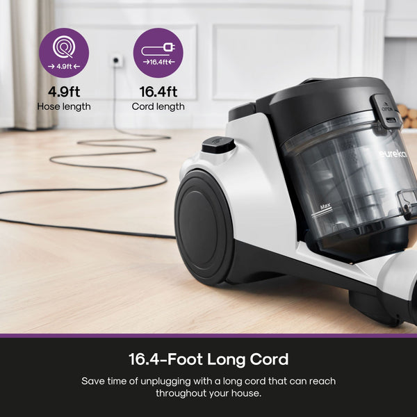 Eureka vacuum cleaner with long cord on a wooden floor, showing hose and cord lengths.