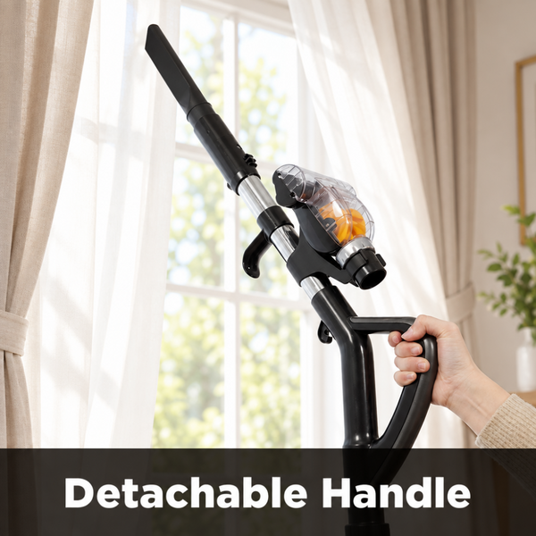Hand holding a vacuum cleaner with a detachable handle against a white background