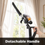 Hand holding a vacuum cleaner with a detachable handle against a white background