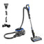 A blue and black Eureka bagless canister vacuum cleaner with various attachments displayed alongside.