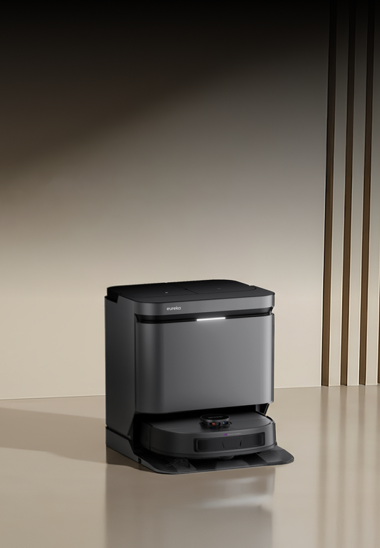 Robotic vacuum cleaner on a reflective surface with a neutral background
