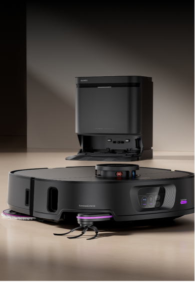 Robotic vacuum cleaner on a wooden floor with a dark background