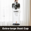 Eureka extra-large dust cup held by a hand with a white curtain background